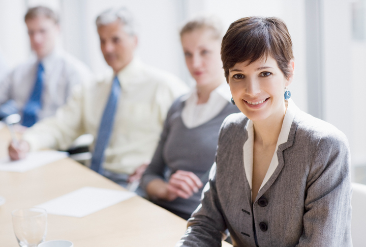 Smiling businesswoman in conference room